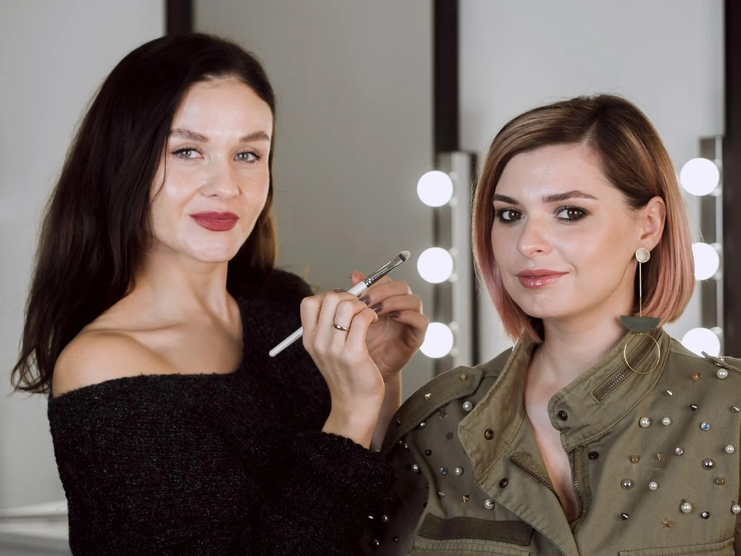Aspiring makeup artist practising professional makeup application techniques.