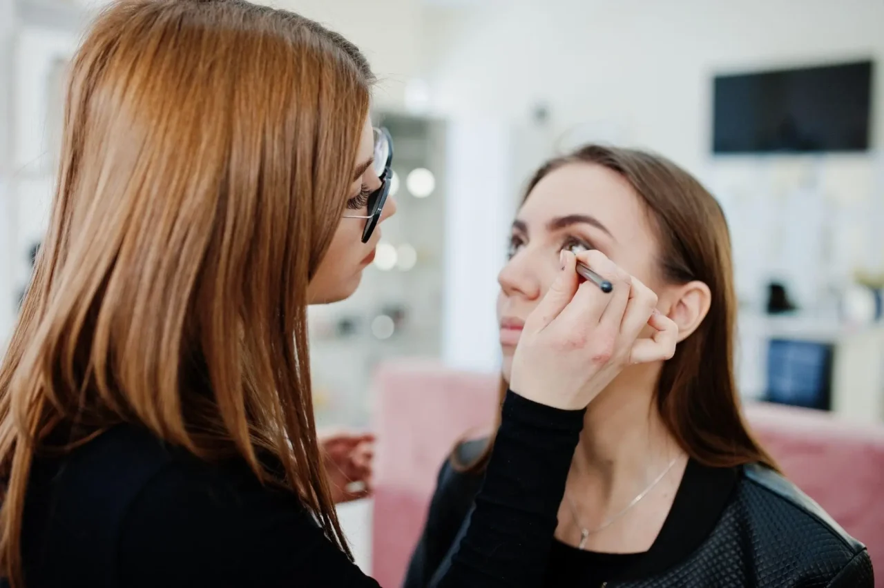 Student practicing eyelash extensions during a lash course in Calgary